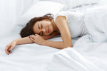 Attractive-woman-sleeping-in-bedroom-491844198_5760x3840