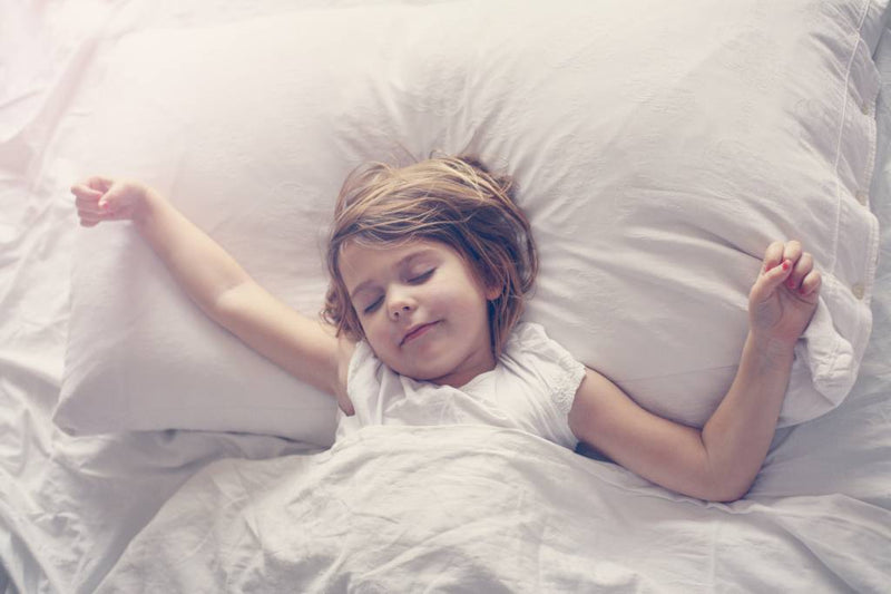 Cute-little-girl-in-bed.-645549164_4368x2912