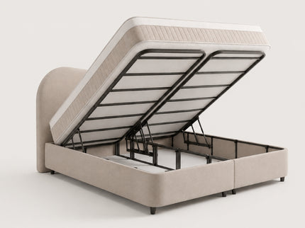 Geopende opbergruimte van Boxspring Arcus met stevig lattenbodemframe en hydraulisch openklapmechanisme