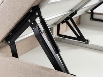 Boxspring Julia in beige, detail van opbergmechanisme met gasveren