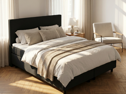 Boxspring Julia met opbergruimte in zwart, sfeerbeeld met zithoek