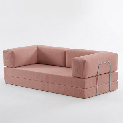 Slaapbank Fluffy in oud roze als sofa, hoekaanzicht op witte achtergrond