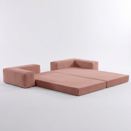 Slaapbank Fluffy in oud roze, gedeeltelijk uitgeklapt tot bed